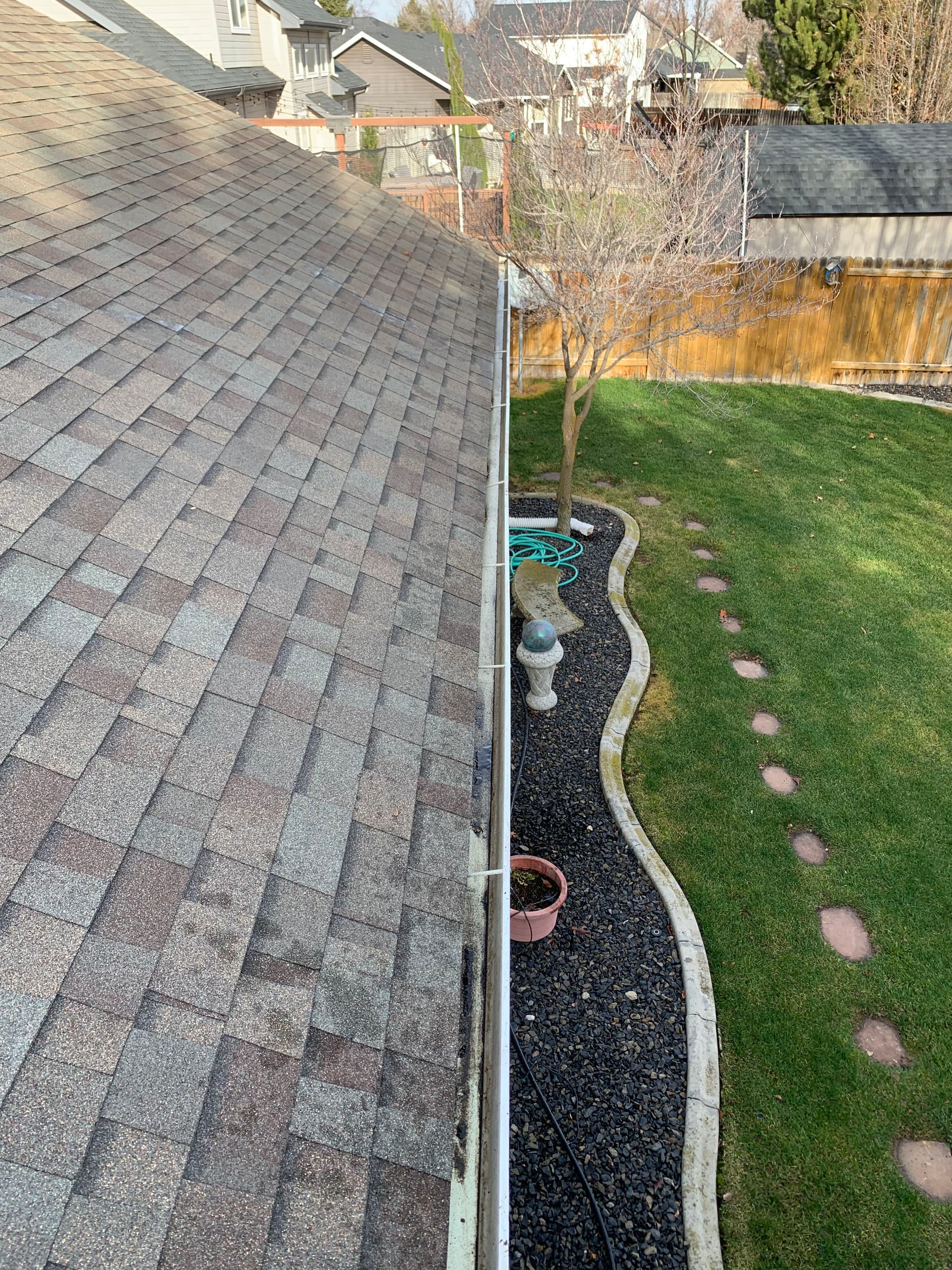 Spotless Gutters and Windows for Your Home's Curb Appeal