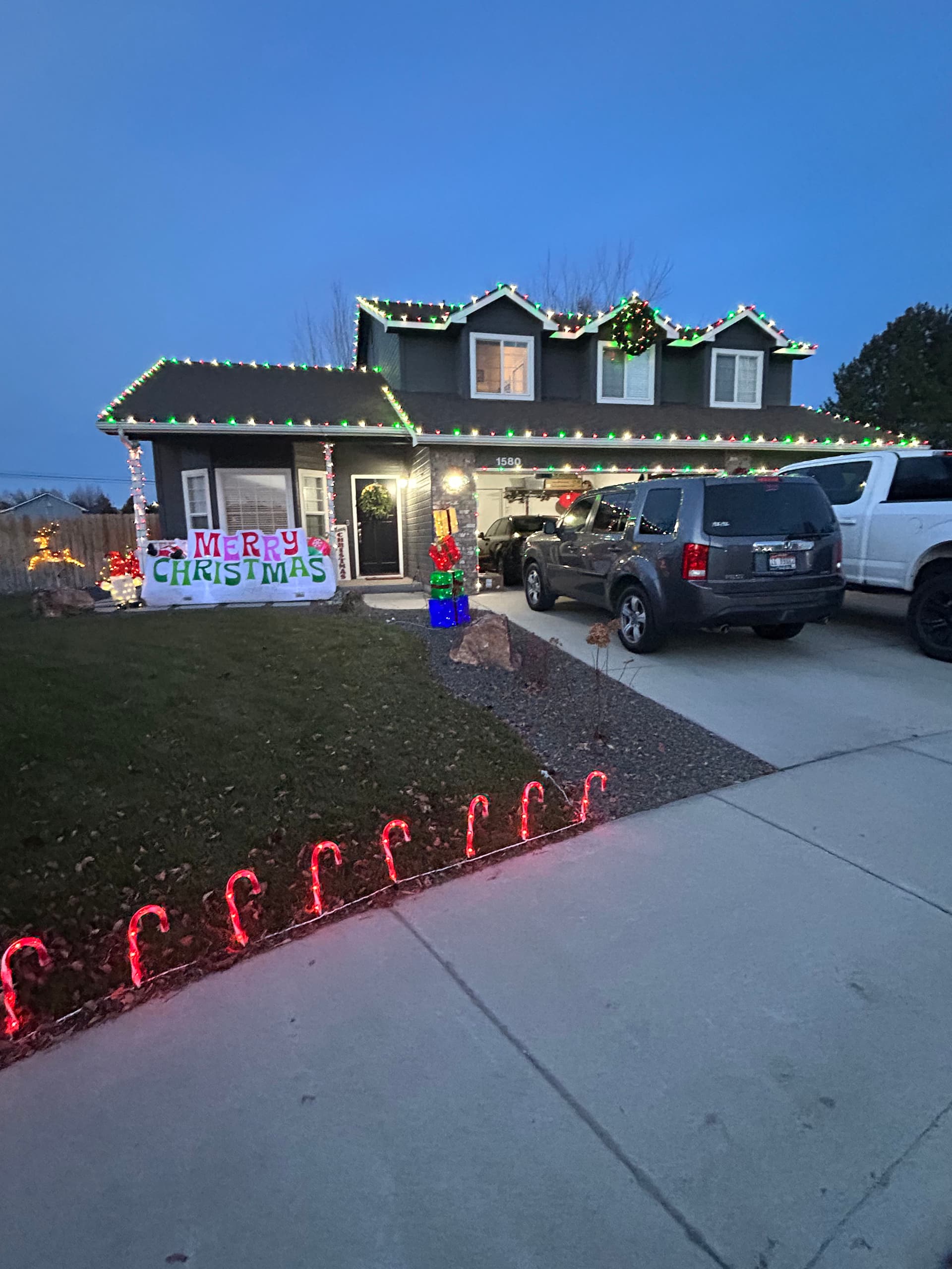 Festive Holiday Light Installation at Local Home image
